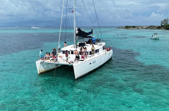 A catamaran anchored off a cay near Nassau